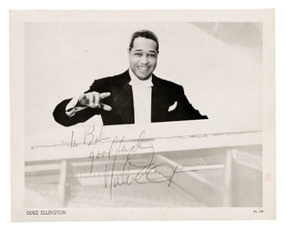 [Jazz & Song] Ellington, Duke. (1899-1974) & Band [Rex Stevens, Joya Sherrill, Johnny Hodges, Sonny Greer, Harry Carney, Claude Jones, Lawrence Brown, Shelton Hemphill , Otto Hardwick, Jimmy Hamilton]  Signed Photograph of Ellington and his Band