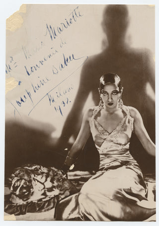 Baker, Josephine. (1906–1975) [Mariotti, Mario. (1899–1975)] Signed Photograph - An Alluring Portrait on a Tiger Skin Rug