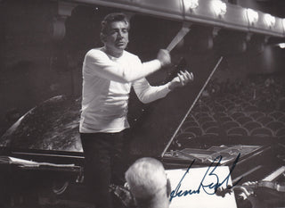 Bernstein, Leonard. (1918–1990) Signed Photograph on the Podium