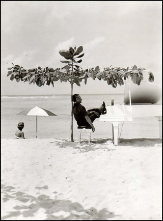 Borge, Victor. (1909–2000) Vintage Photograph Playing Piano on Beach!