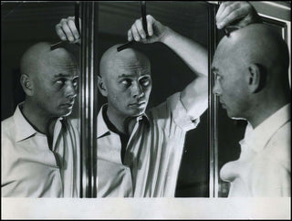 [Film & Theatre]  Brynner, Yul. (1920–1985) Original Photograph of Brynner shaving his head!