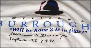 [Literature & Art] Burroughs, William S. (1914 - 1997) "Will he have 3-D on Time?"  - Signed gun-shot T-Shirt, 1996.