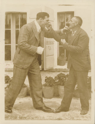 [Boxing] Carnera, Primo. (1906–1967) "'Da Preem' Shows Dad the 'K.O.' Wallop" - Photograph