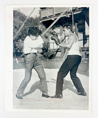 [Hollywood] Chaplin, Charlie. (1889-1977) & Fairbanks, Douglas. (1883 - 1939) Photograph of Chaplin and Fairbanks Boxing