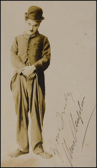 [Film] Chaplin, Charlie. (1889-1977) Signed Photograph as Tramp