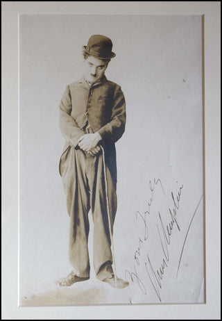 [Film] Chaplin, Charlie. (1889-1977) Signed Photograph as Tramp