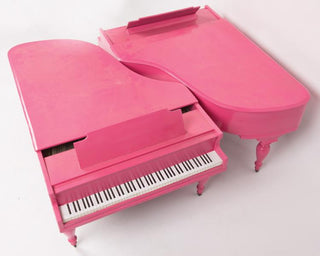 [Duchin, Eddy. (1909–1951)] [Reynolds, Debbie. (1932–2016)] Two Oversize Pink Toy Pianos from "The Eddie Duchin Story"