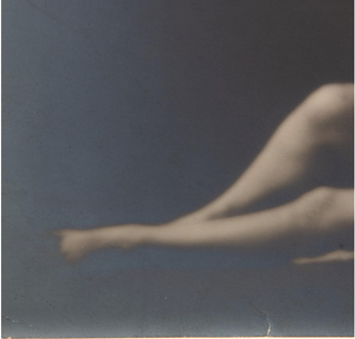 Duncan, Isadora. (1877–1927) [Genthe, Arnold (1869–1942)] Isadora Duncan in Reclining Dance Pose - Original Photograph