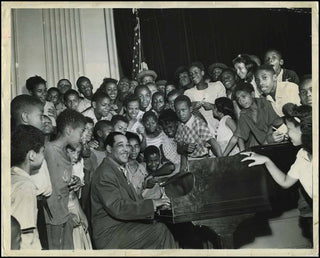 [Jazz & Song] Ellington, Duke. (1899-1974)  Vintage Photograph performing for Harlem youth