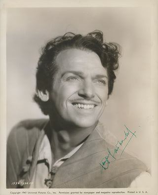 Fairbanks Jr., Douglas. (1909-2000) Signed Promotional Photograph in costume for "The Exile"