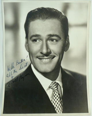 Flynn, Errol. (1909–1959) Signed Photograph