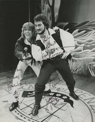 [Gilbert & Sullivan] Belushi, Jim. (b. 1954) & Noone, Peter. (b. 1947) "The Pirates of Penzance" - Signed Photograph