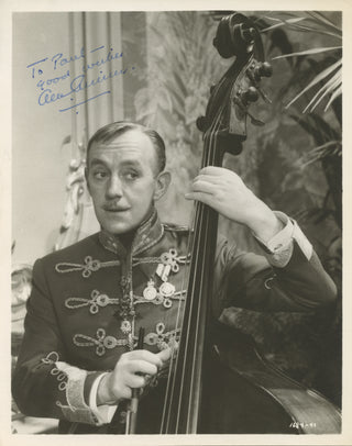 Guinness, Alec. (1914–2000) Signed Photograph Playing Double Bass