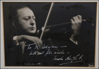 Heifetz, Jascha. (1901–1987) Signed Photograph, inscribed to Remo Bolognini.