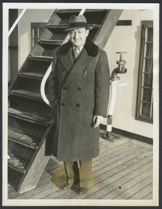 Heifetz, Jascha. (1901–1987) Original Press Photograph Arriving in Manhattan