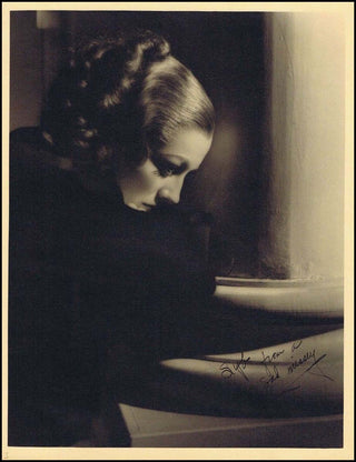 [Film & Theatre] Crawford, Joan. (1905–1977) [George Hurrell (1904–1992)] Signed Photograph to MGM make-up artist, Sybil Jones