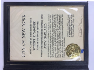 Garland, Judy. (1922–1969) Judy Garland Award Proclamation from New York City Mayor Robert F. Wagner in Custom Presentation Folder