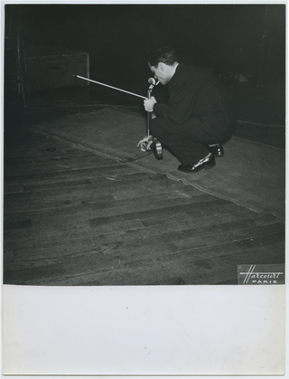 Kogan, Leonid. (1924–1982) [Harcourt] Original Photograph lighting a Cigarette with Violin in Hand!