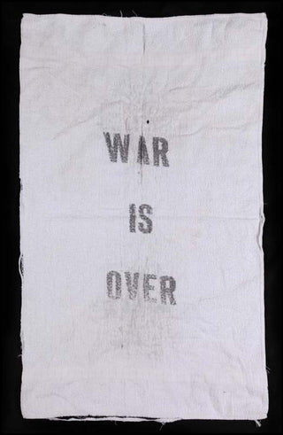 [Jazz & Song] [Beatles] Lennon, John. (1940 - 1980)   "War Is Over" towel from Lennon's New York apartment in the Dakota.