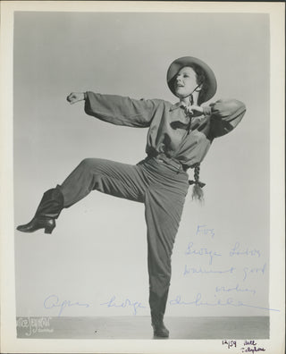 Mille, Agnes de. (1905–1993) [Copland, Aaron. (1900–1990)] Signed Photograph in Rodeo