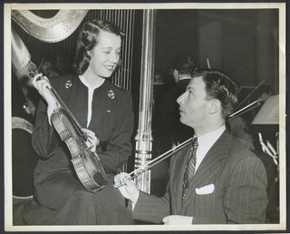 Milstein, Nathan. (1903–1992) & Pons, Lily. (1898–1976) Two Photographs Showing His Violin