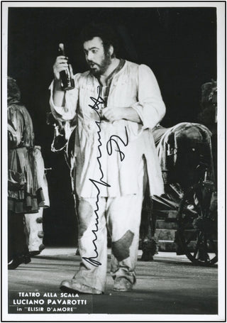 Pavarotti, Luciano. (1935-2007) Signed Photograph in L&apos;Elisir d&apos;Amore.