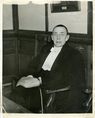 Rachmaninoff, Sergei. (1873–1943) Original Press Photograph Warming His Hands