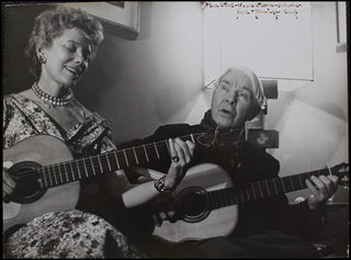 Sandburg, Carl. (1878 - 1967) Signed Photograph Playing Guitar, inscribed to Ethel Smith