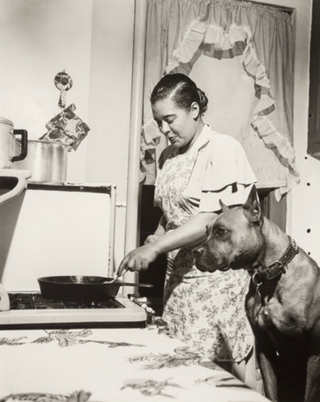 [Holiday, Billie. (1915–1959)] Leonard, Herman. (1923–2010) Billie Holiday with "Mister", 1949