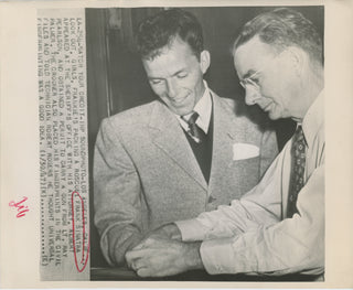 Sinatra, Frank. (1915–1998) Original Press Photograph, Being Fingerprinted