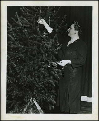 Traubel, Helen. (1899 - 1972) 1944 Photograph Decorating a Christmas Tree