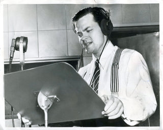 Welles, George Orson. (1915–1985) In the Studio for "War of the Worlds" - Vintage Press Photograph