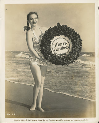 [Beach Christmas] Whelan, Arleen. (1916–1993) "Merry Christmas—From Pacific Sands to You" - Promotional Photograph